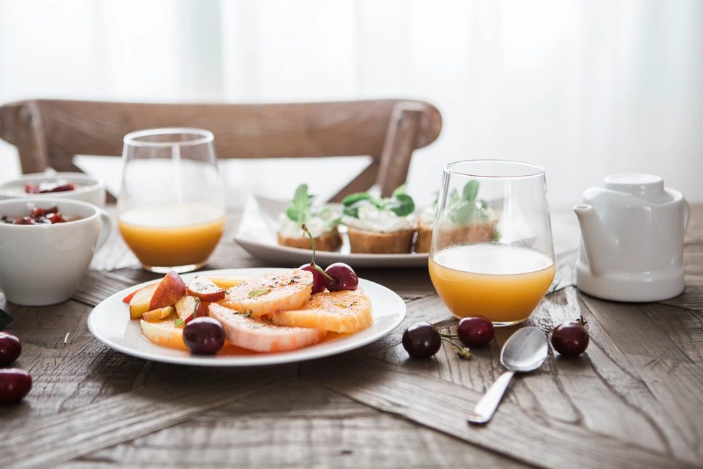 Brunch table with fruit and juice